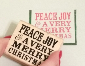 STEP 2 - Stamp a Christmas sentiment on a square piece of cardstock. Border with contrasting color.
